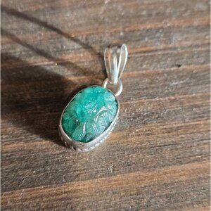 Sterling Silver Pendant With Carved Emerald Green Stone